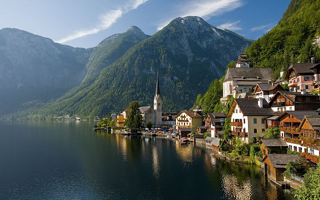 Paddle boarding on the lake as HALLSTATT, AUSTRIA