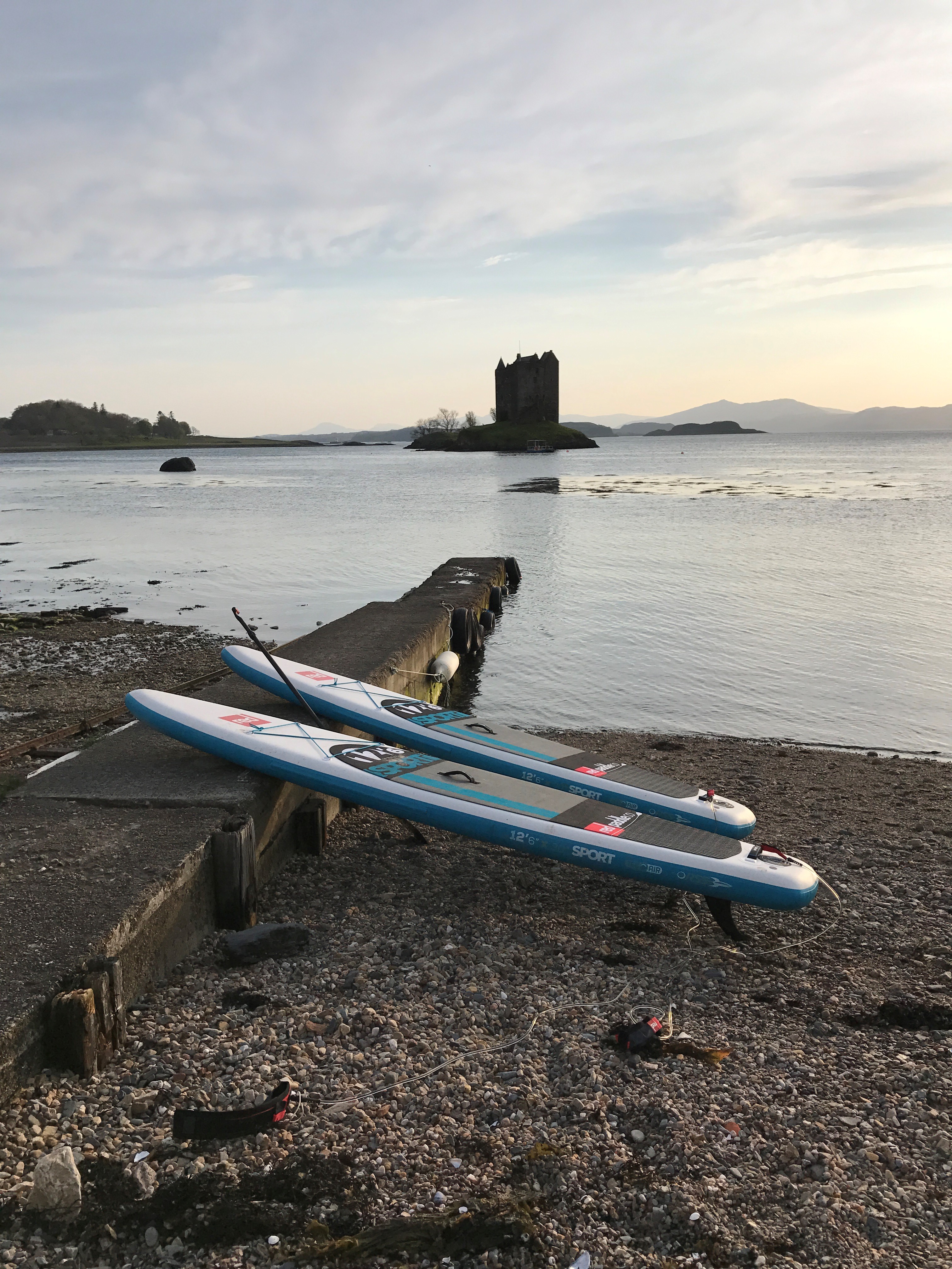 Paddle boards in Castle Stalker in Appin