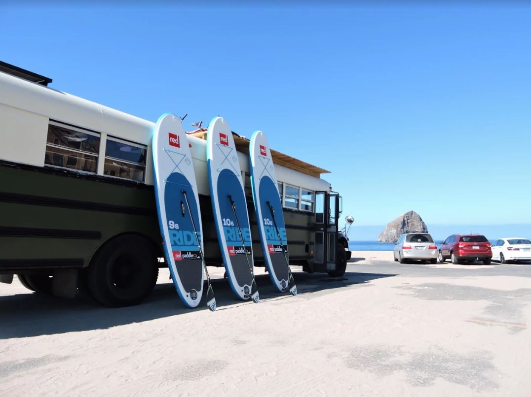 Three Ride Paddle Boards and Bus