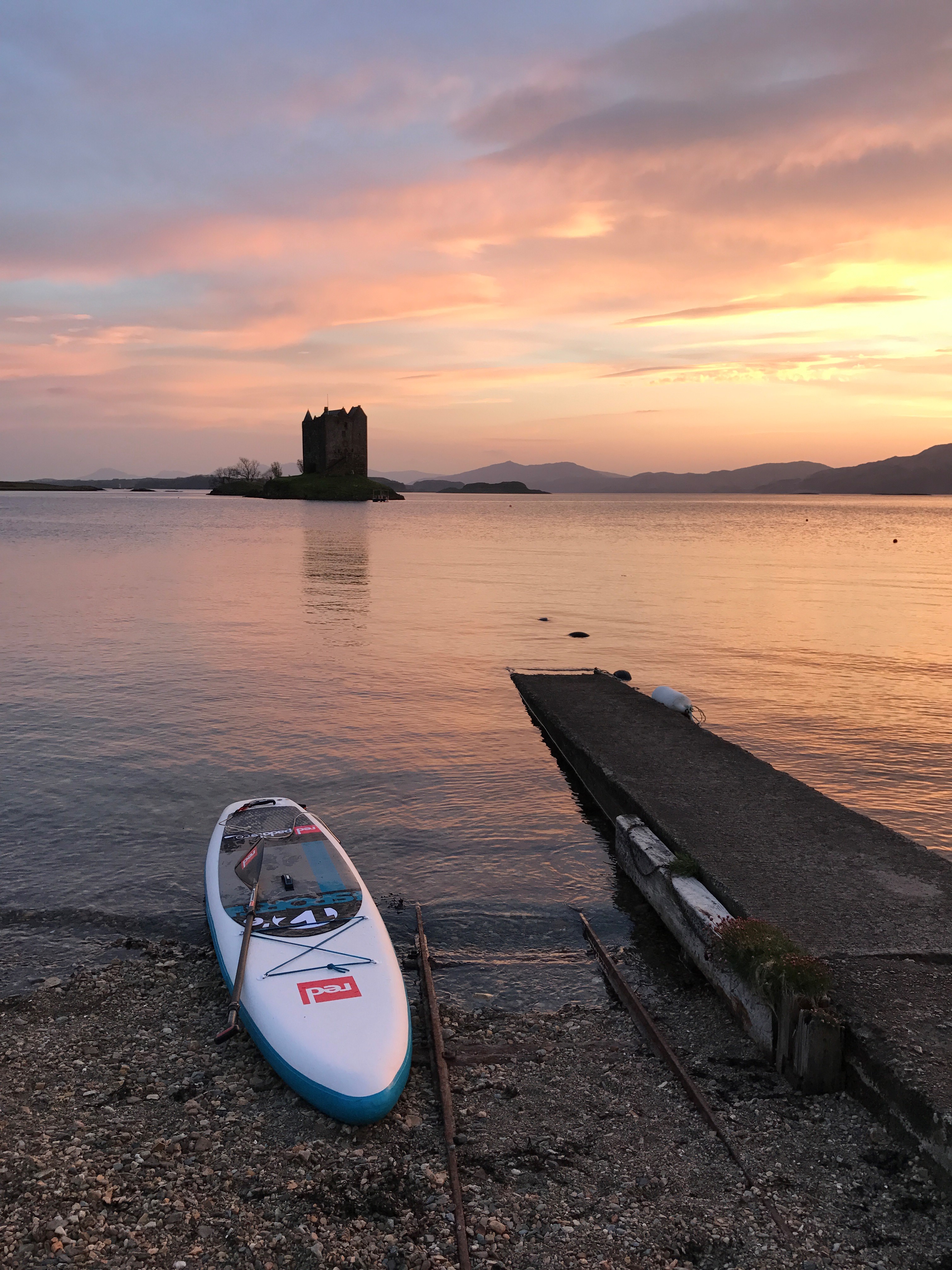 Paddle board in sunset