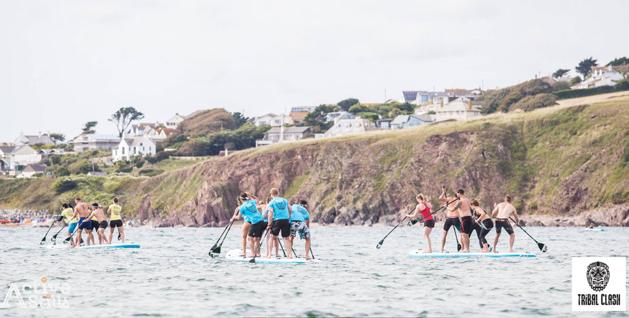 Teams on paddle boards