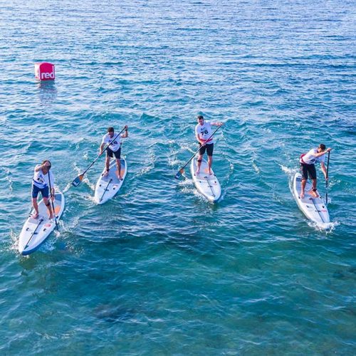 group finish to an SUP race on Red Paddle Co 14'0" Elite inflatable boards