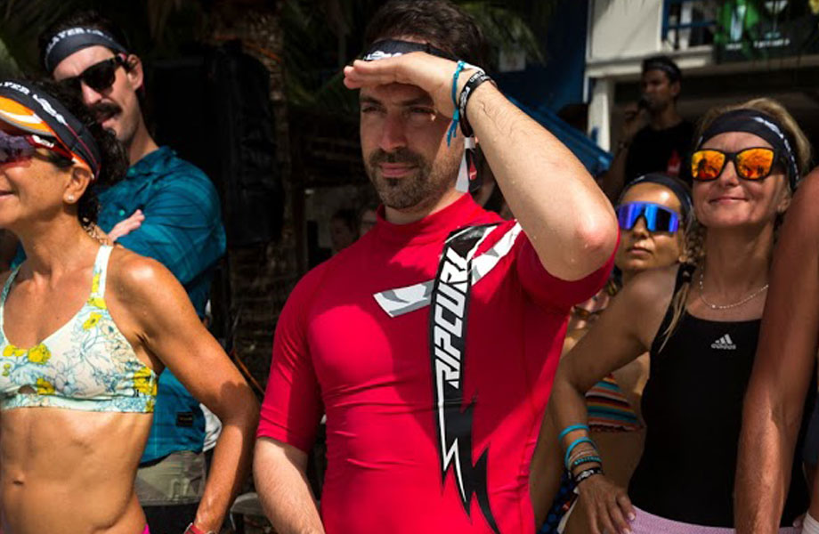 man looks out at team event