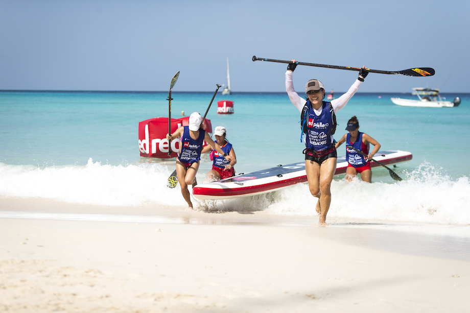 Female team celebrating winning a race at the dragon world championships 