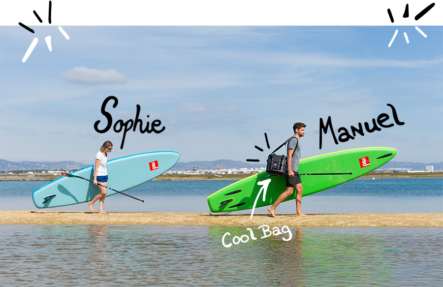 Friends walk with paddle boards on beach