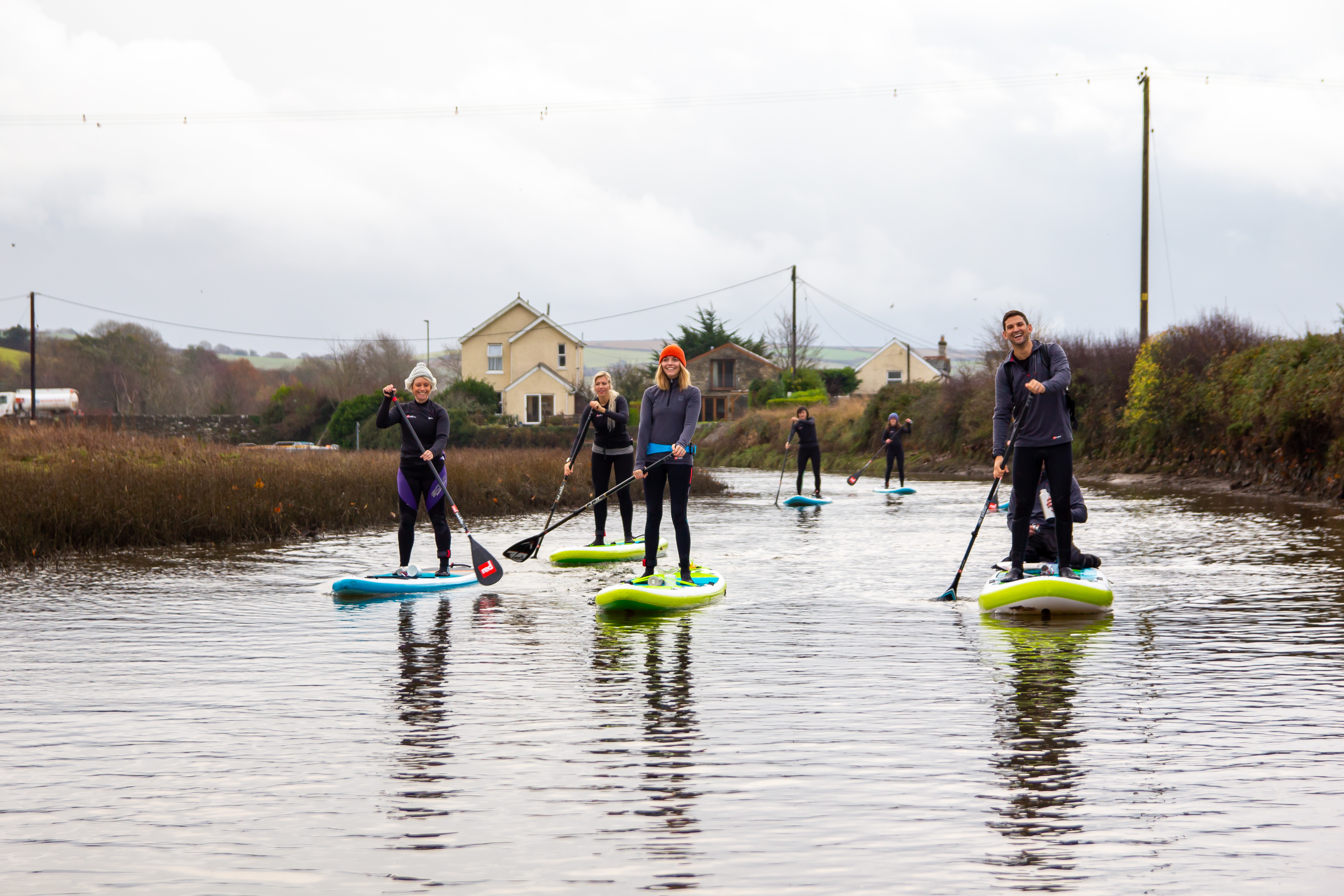 Group of paddle boarders on the River Avon, Devon