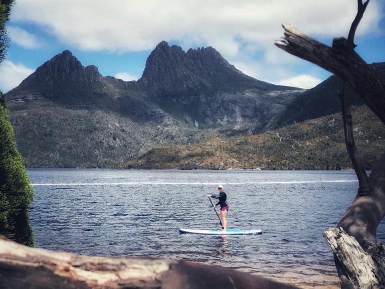 stand up paddleboarding on Dove Lake, Tasmania